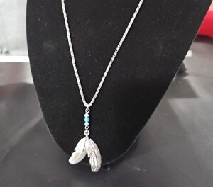 Silver Feather Pendant Necklace